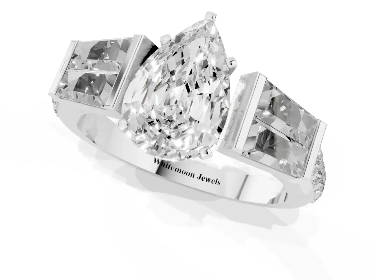 Pear Cut Diamond Engagement Ring with Baguette Side Stones and Channel Set Band Platinum