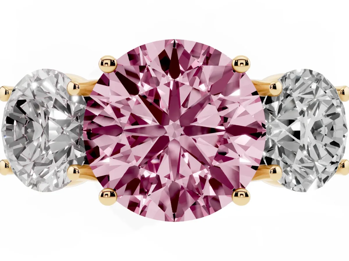 Fancy Pink Three-Stone Round Cut Diamond Engagement Ring with Prong Setting Yellow gold