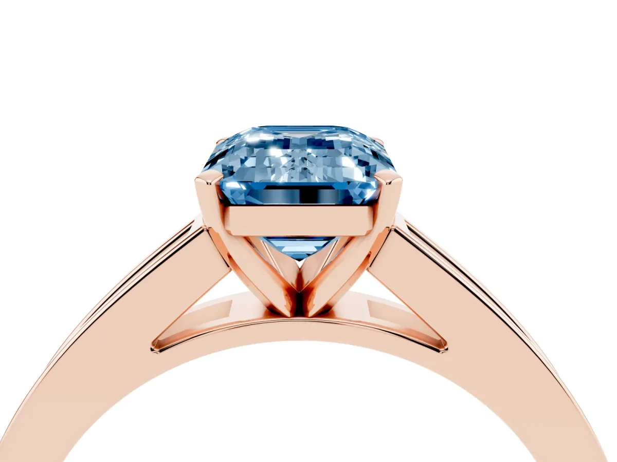 Fancy Blue Emerald Cut Solitaire Diamond Ring with Channel-Set Band and Four-Prong Setting Rose gold