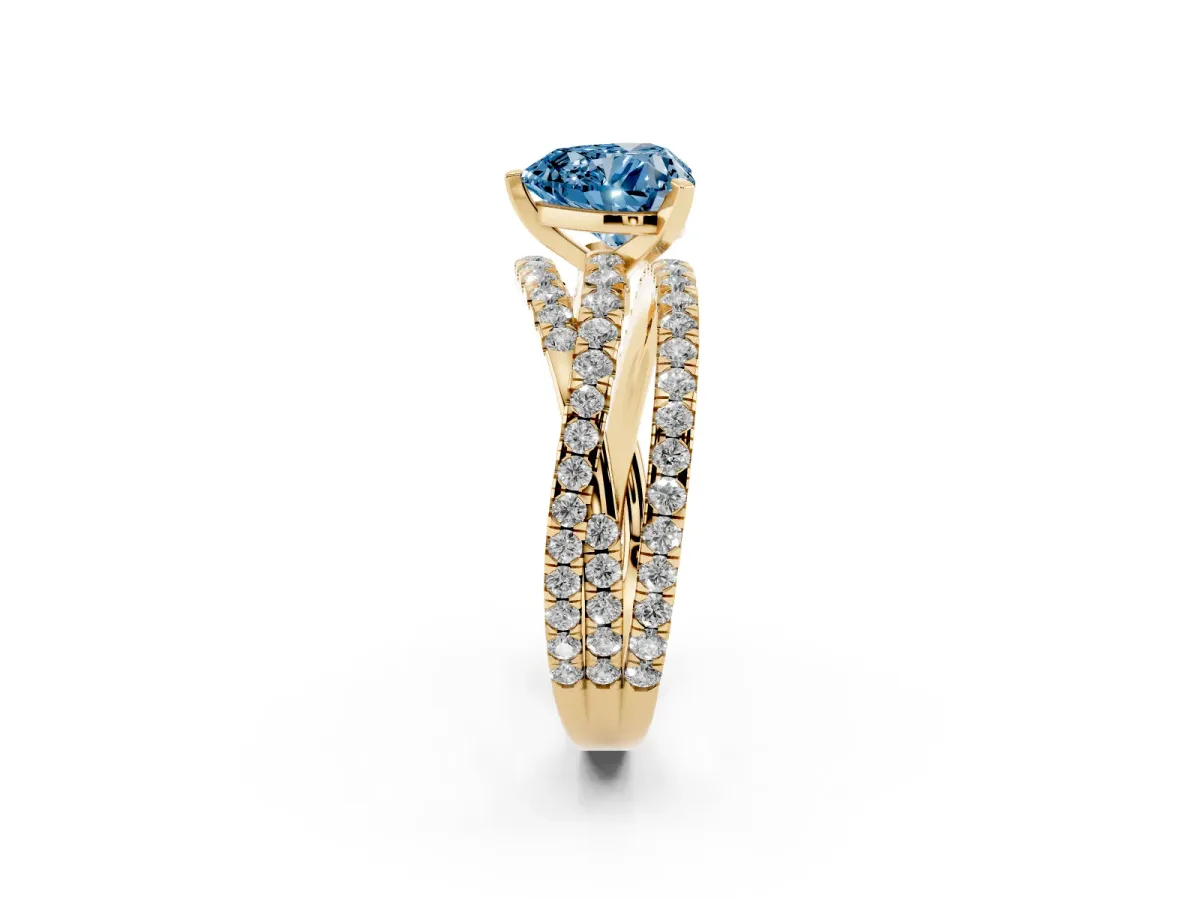 Fancy Blue Heart Cut Solitaire Twist Band with Pavé Setting and Four-Prong Setting Yellow gold