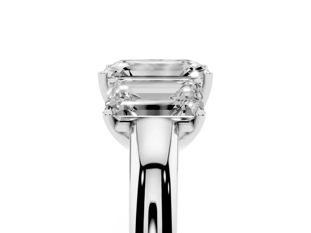 Emerald Cut Diamond Three-Stone Ring with Four-Prong Setting and Classic Band Platinum