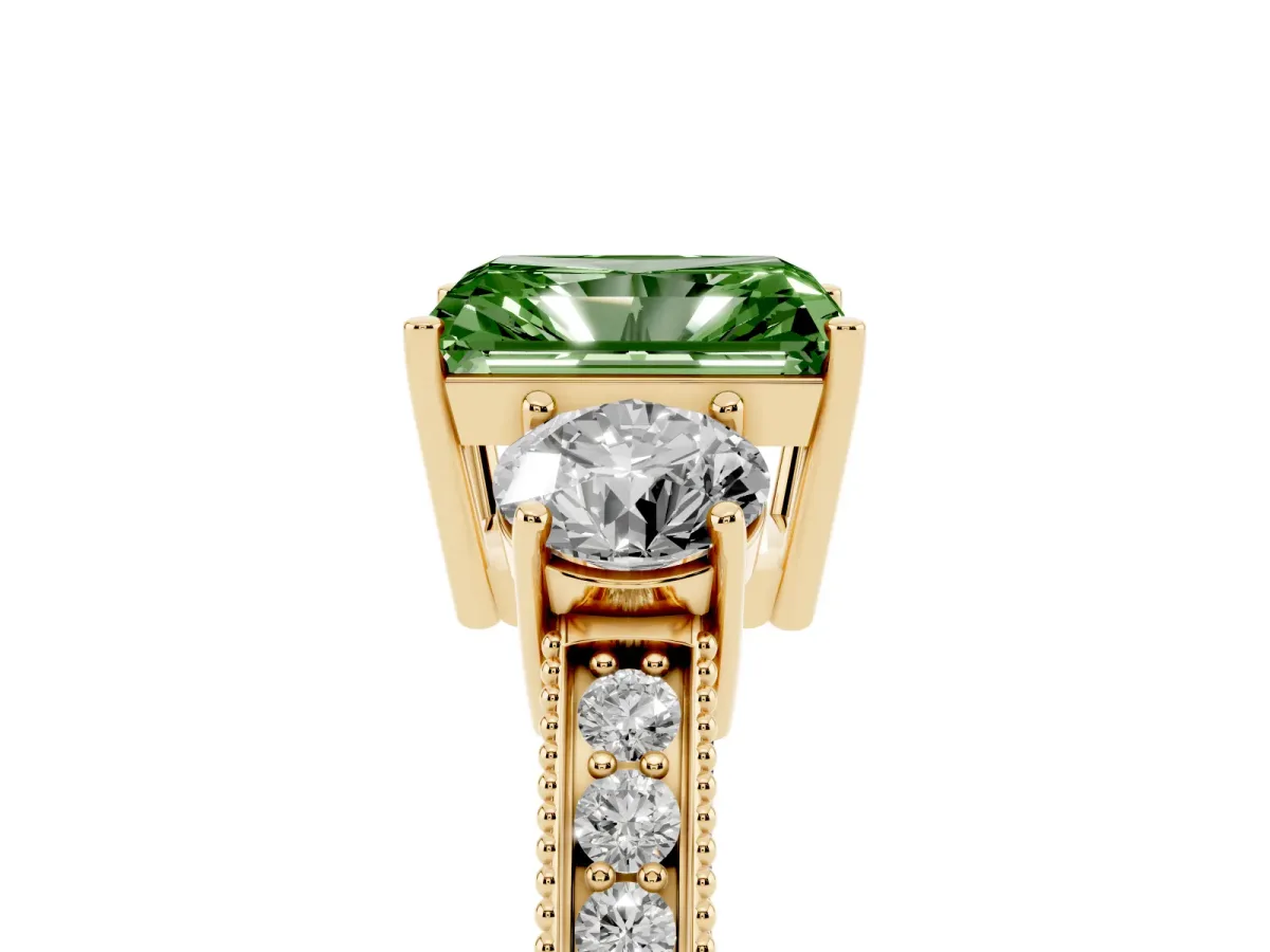 Fancy Green Radiant Cut Three-Stone Diamond Ring with Pavé Band and Four-Prong Setting Yellow gold