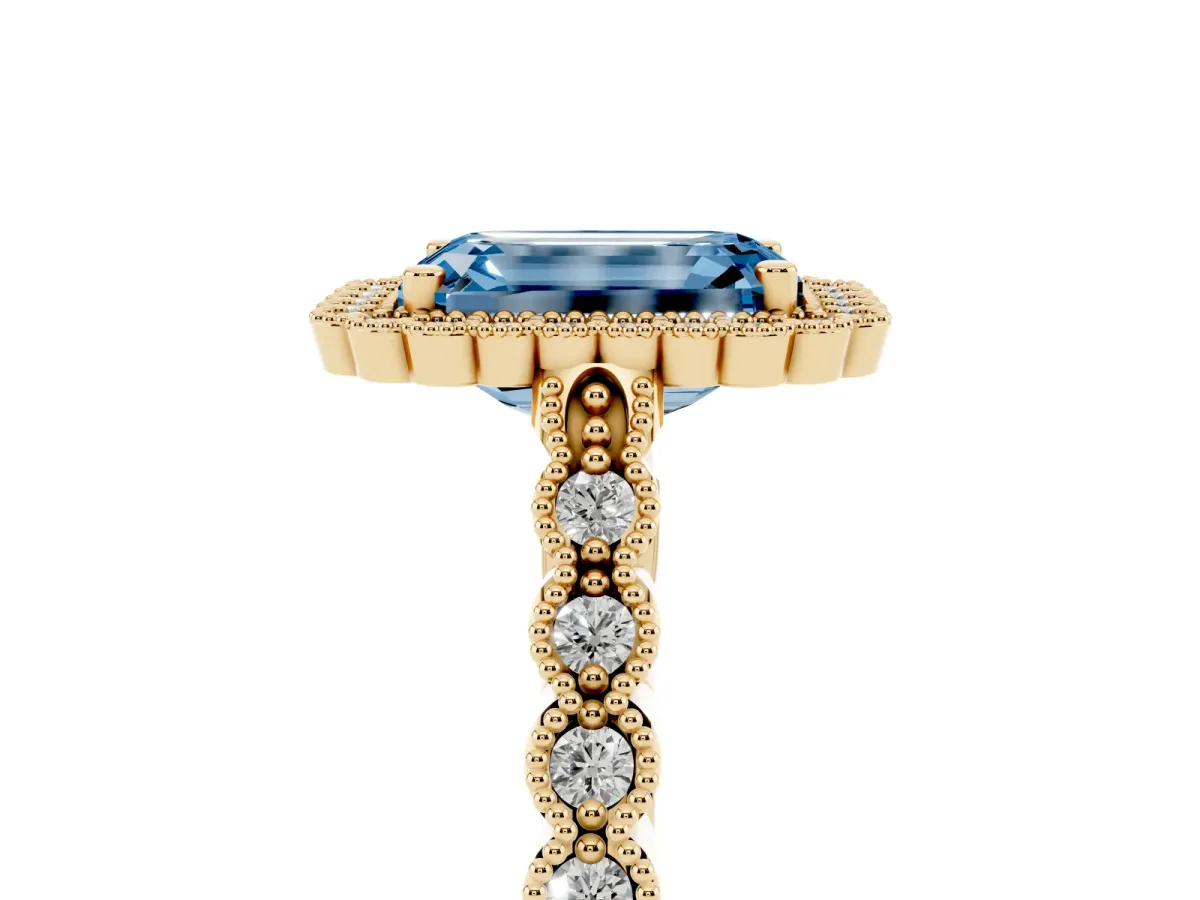 Fancy Blue Emerald Cut Cut Halo Pavé Solitaire Ring with Milgrain Band Yellow gold
