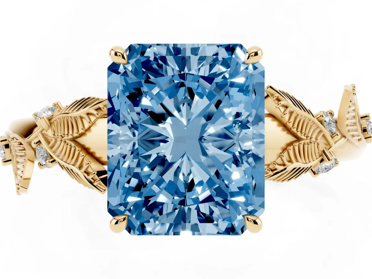Fancy Blue Radiant Cut Diamond Solitaire Ring with Leaf Motif Band and Four-Prong Setting Yellow gold