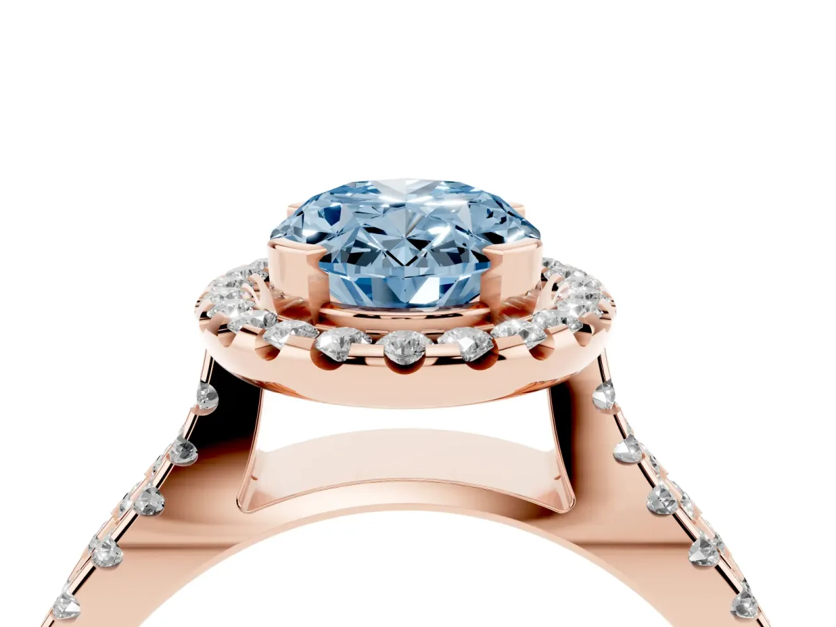 Fancy Blue Oval Cut Diamond Halo Ring with Split Shank Pavé Band and Prong Setting Rose gold