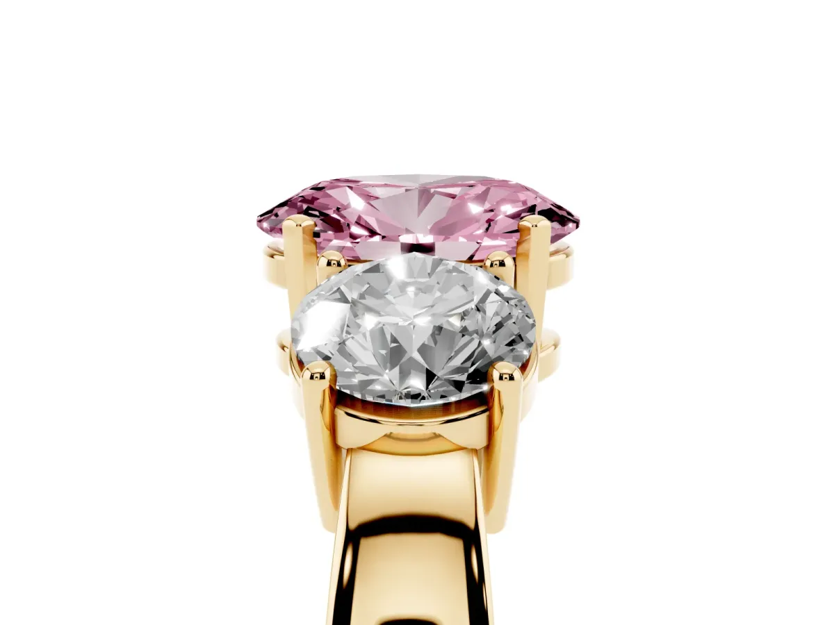 Fancy Pink Three-Stone Oval Cut Diamond Ring with Round Side Stones, Classic Band, and Four-Prong Setting Yellow gold