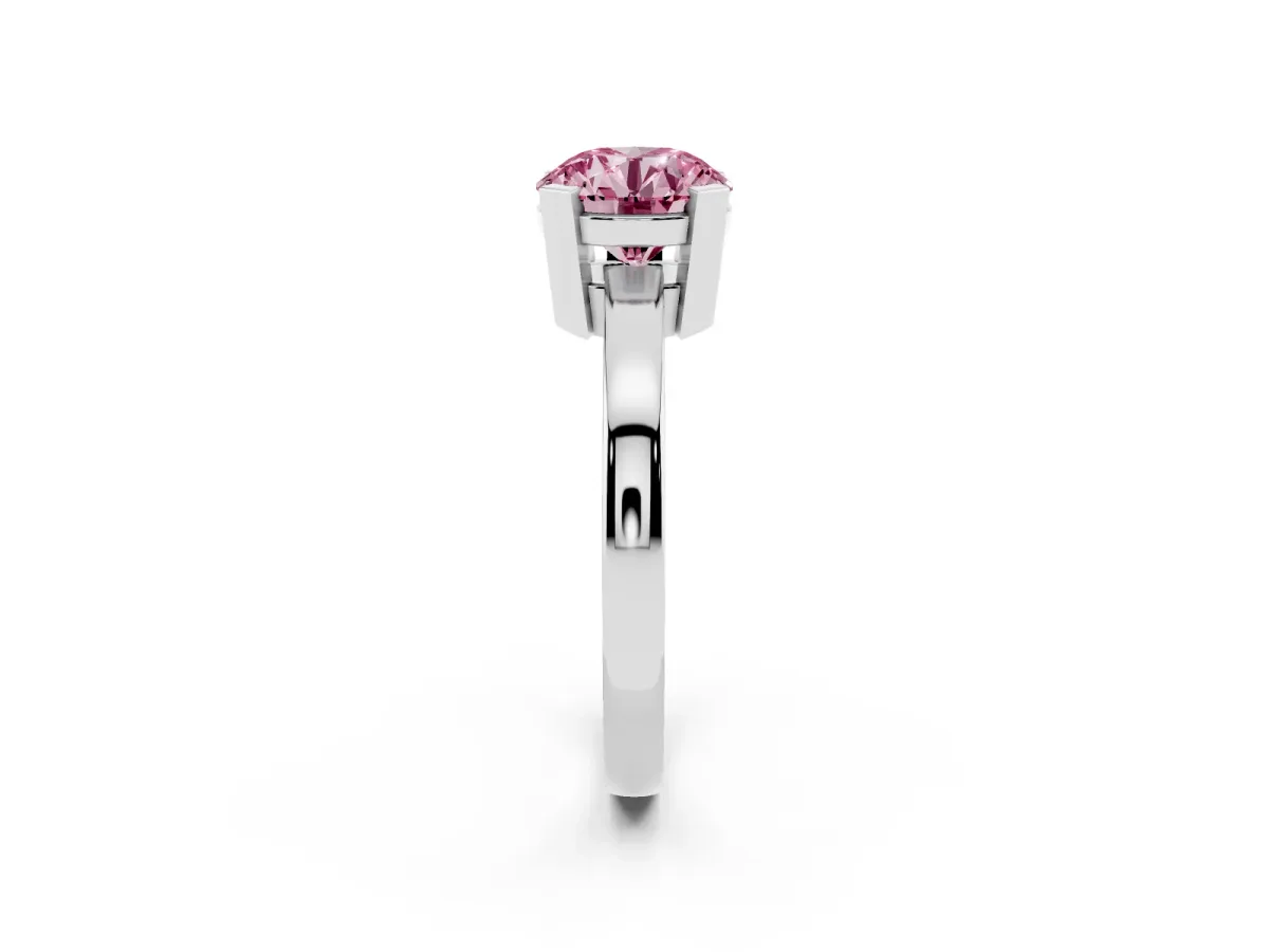 Fancy Pink Round Cut Cut Solitaire Ring with Four-Prong Setting and Classic Band Silver