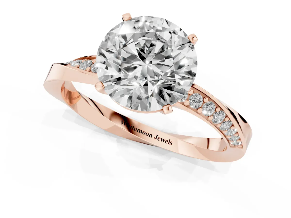 Round Cut Diamond Engagement Ring with Side Stone Accents and Four-Prong Setting Rose gold