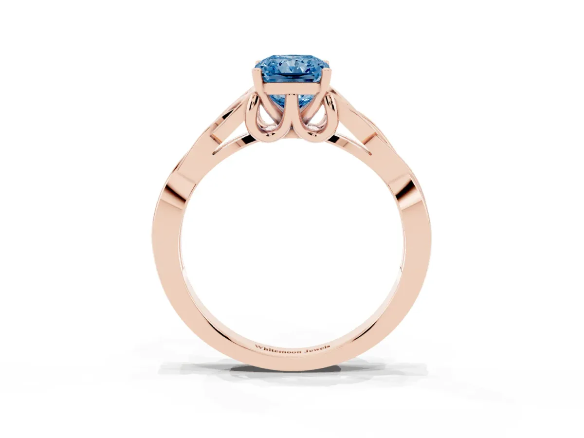 Fancy Blue Radiant Cut Diamond Solitaire Engagement Ring with Celtic Knot Band and Four-Prong Setting Rose gold