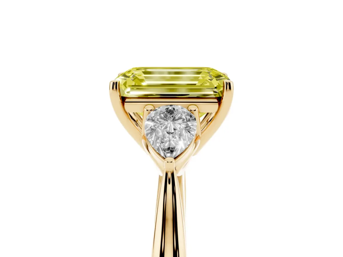 Fancy Yellow Three-Stone Emerald Cut Brilliant Diamond Solitaire Ring with Tapered Band and Four-Prong Setting Yellow gold