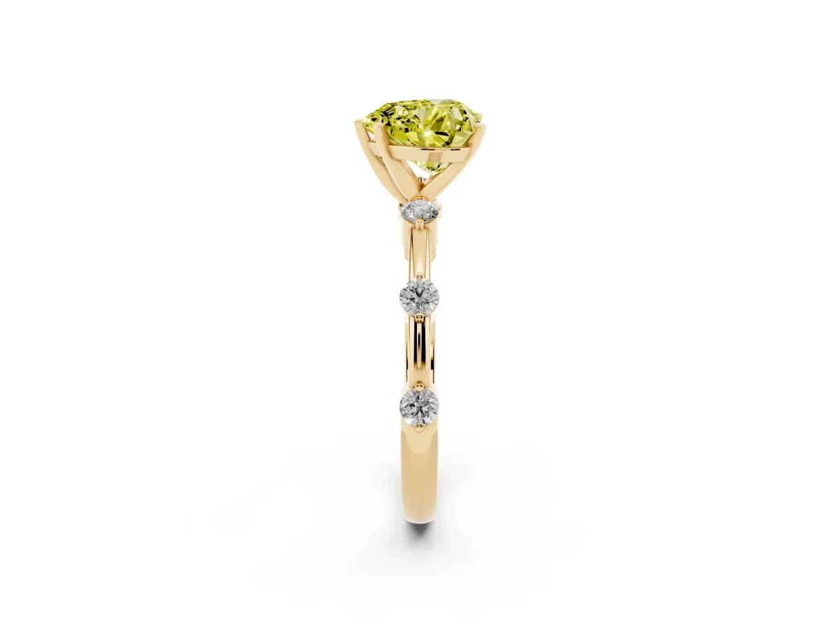 Fancy Yellow Heart Cut Solitaire Diamond Ring with Bezel Set Side Stones and Prong Setting Yellow gold