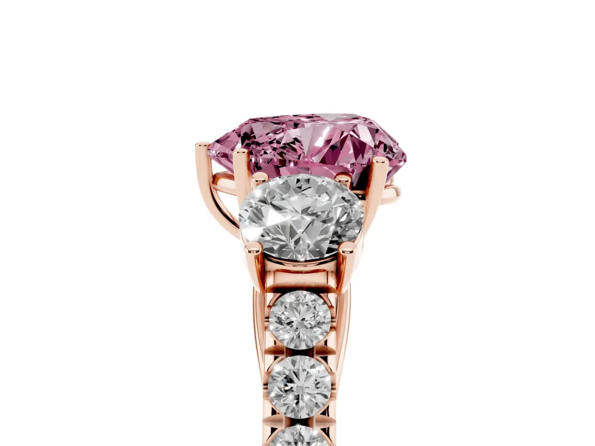 Fancy Pink Heart Cut Cut Diamond Three-Stone Ring with Round Side Stones and Pavé Band Rose gold