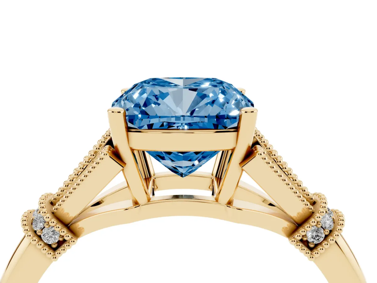 Fancy Blue Cushion Cut Diamond Solitaire Ring with Floral Filigree and Pave Accents Yellow gold