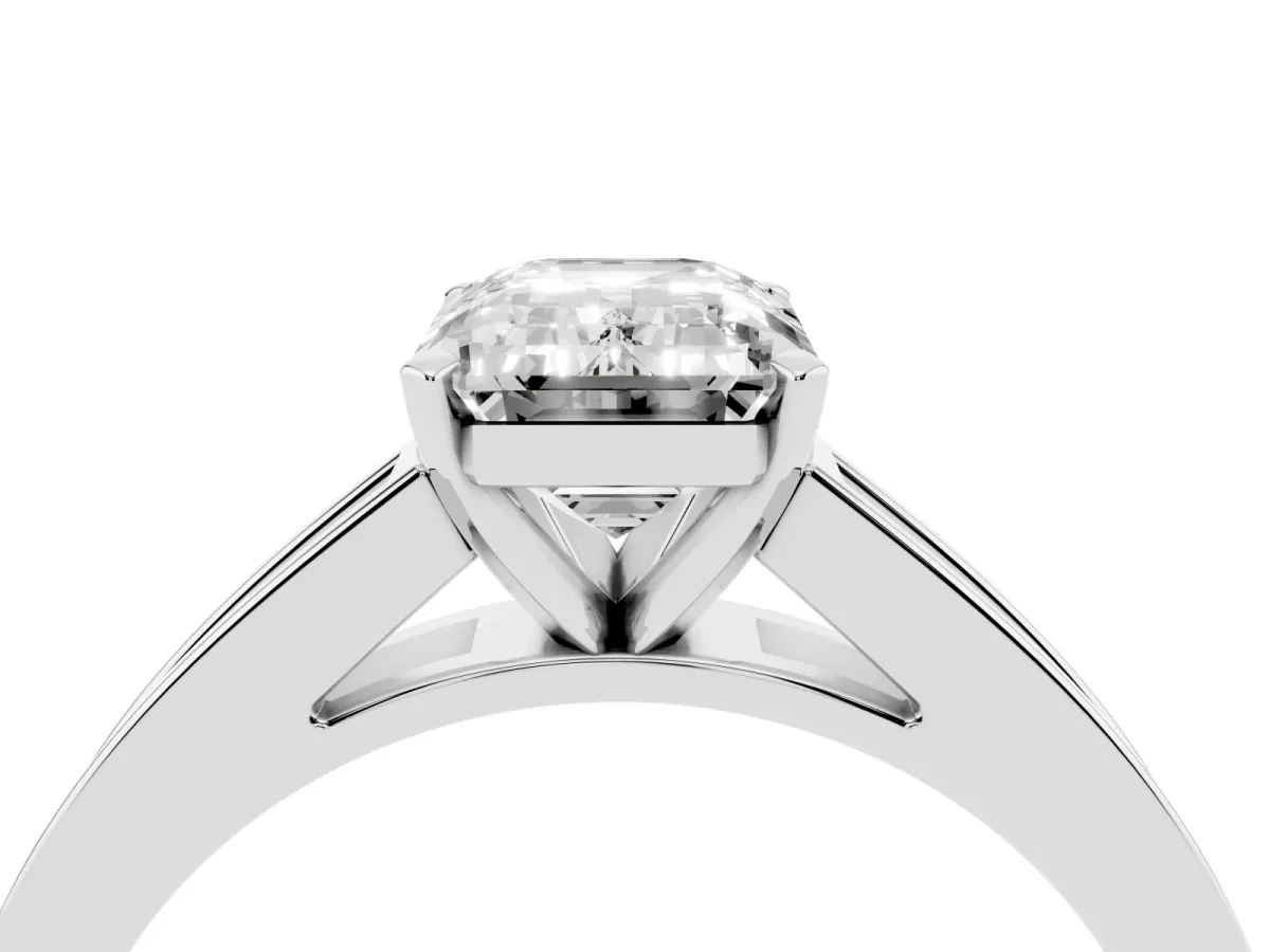 Emerald Cut Solitaire Diamond Ring with Channel-Set Band and Four-Prong Setting Platinum