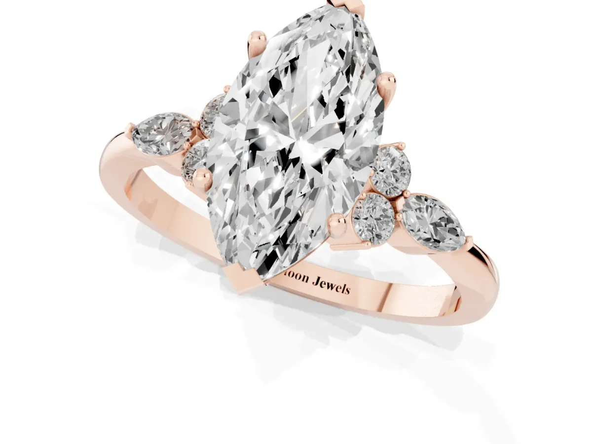 Marquise Cut Brilliant Diamond Solitaire Ring with Pear Side Stones and Four-Prong Setting Rose gold