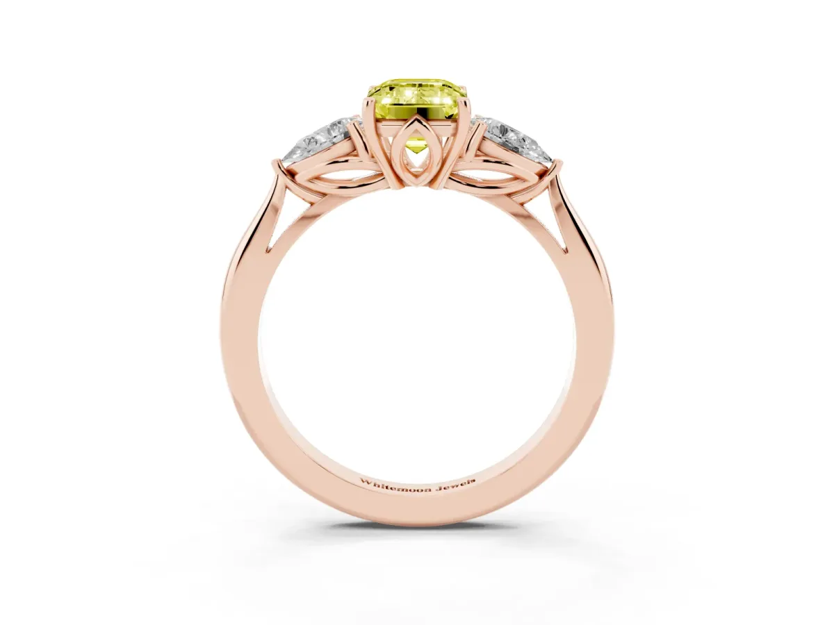Fancy Yellow Three-Stone Emerald Cut Diamond Ring with Pear Side Stones in Four-Prong Setting Rose gold