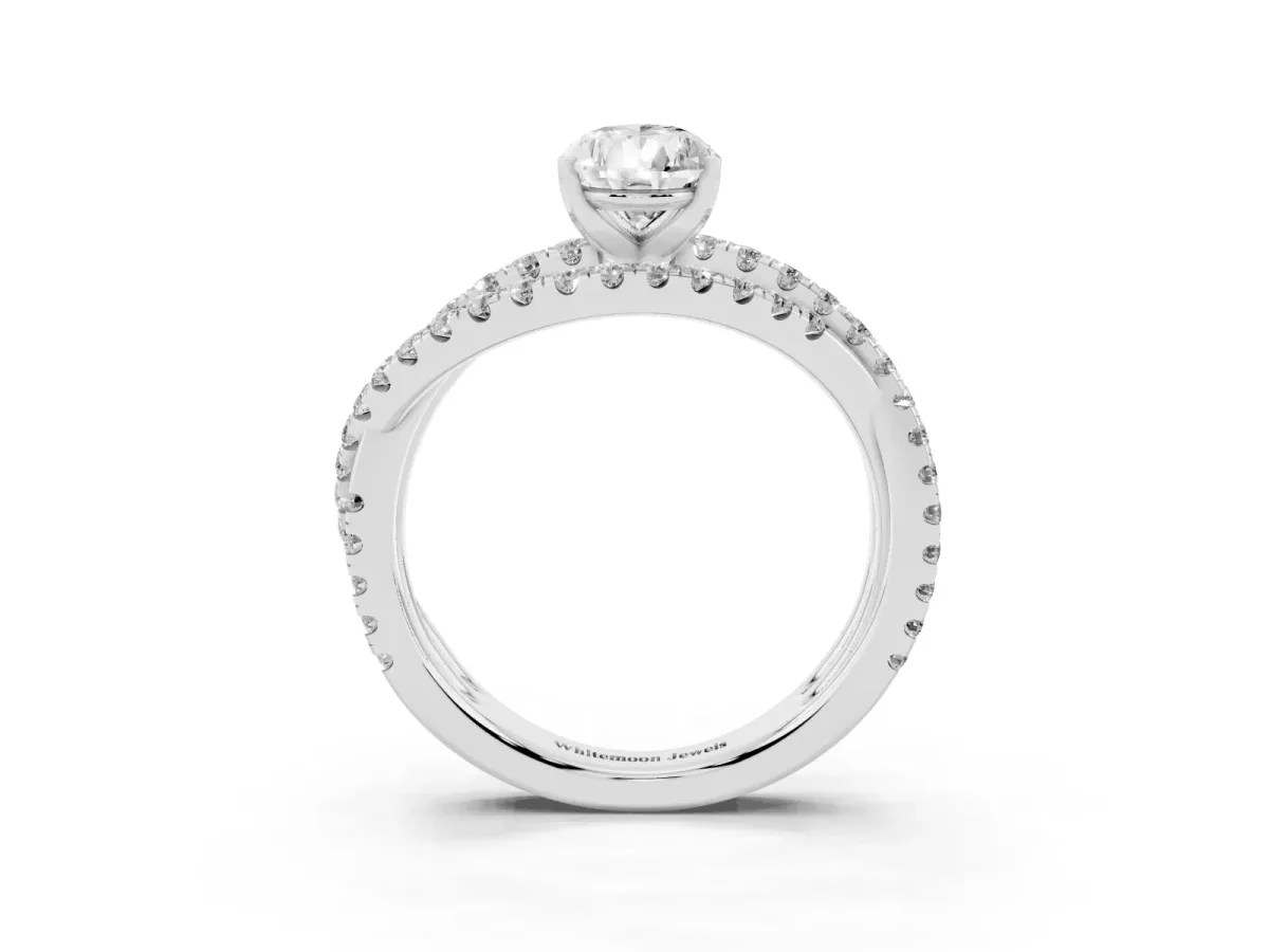 Pear Cut Solitaire Twist Band with Pavé Setting and Four-Prong Setting Platinum