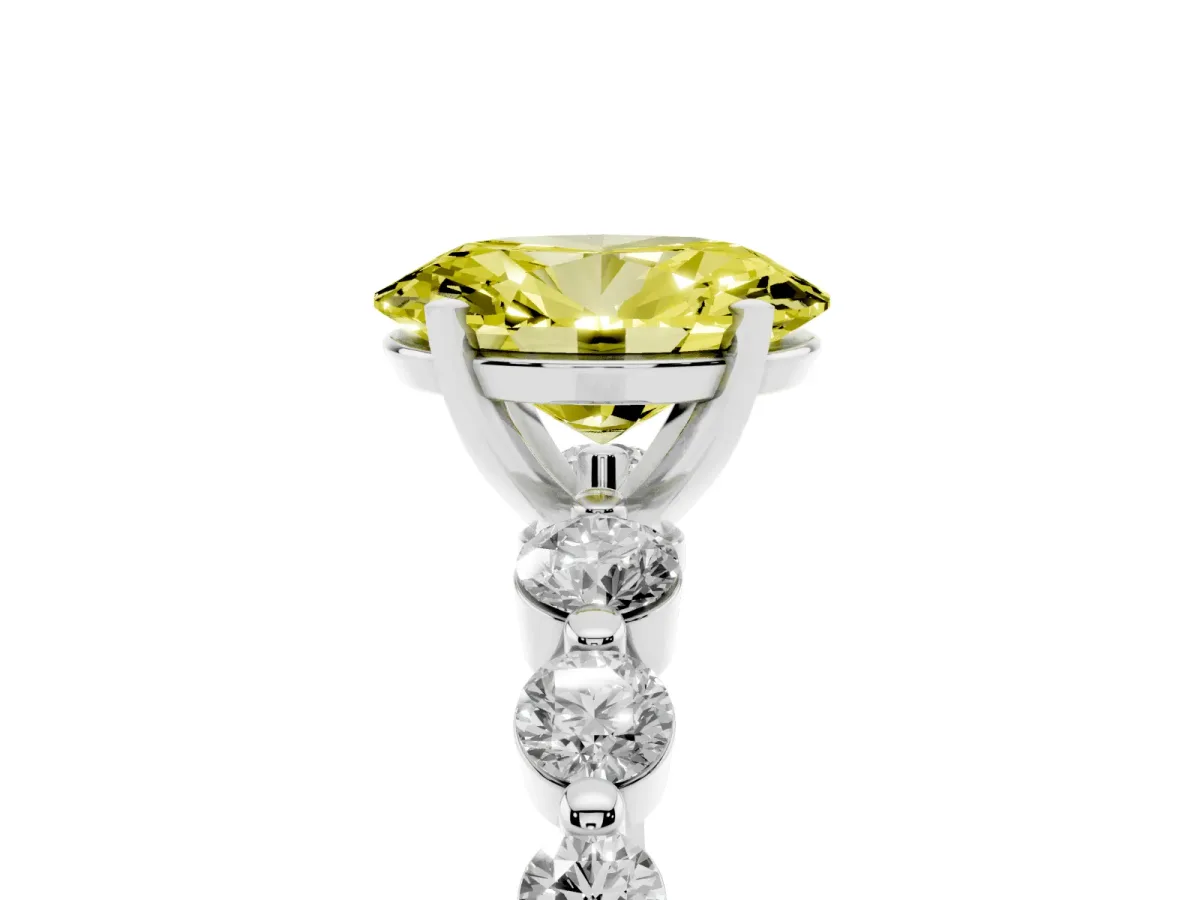 Fancy Yellow Oval Cut Solitaire Diamond Ring with Pave Band and Four-Prong Setting Silver