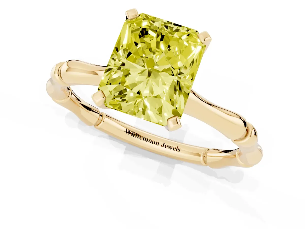 Fancy Yellow Radiant Cut Solitaire Diamond Ring with Bamboo Band and Four-Prong Setting Yellow gold