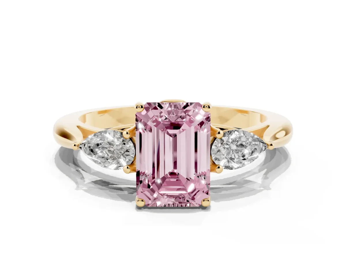 Fancy Pink Emerald Cut Diamond Three-Stone Ring with Pear Side Stones and Prong Setting Yellow gold