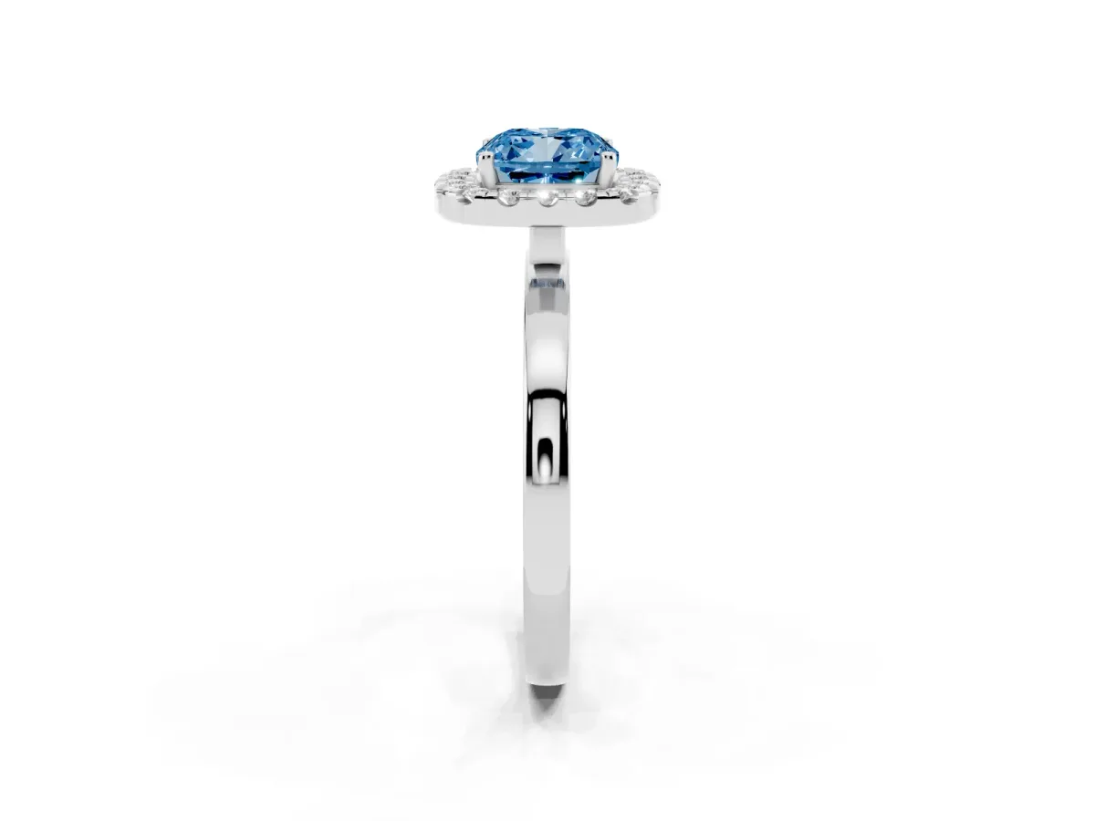 Fancy Blue Cushion Cut Halo Diamond Solitaire with Pavé Band and Four-Prong Setting Silver