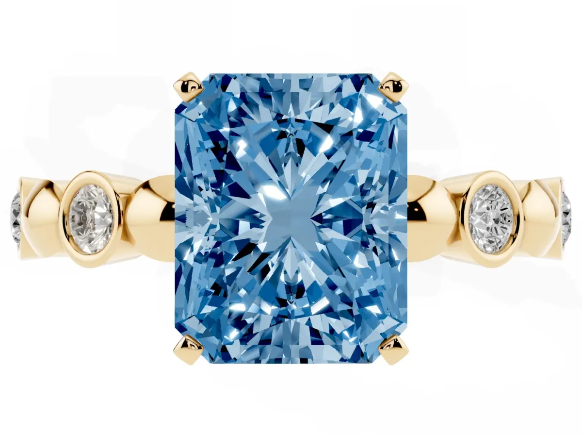 Fancy Blue Radiant Cut Solitaire Bezel-Set Diamond Ring with Beaded Band and Four-Prong Setting Yellow gold