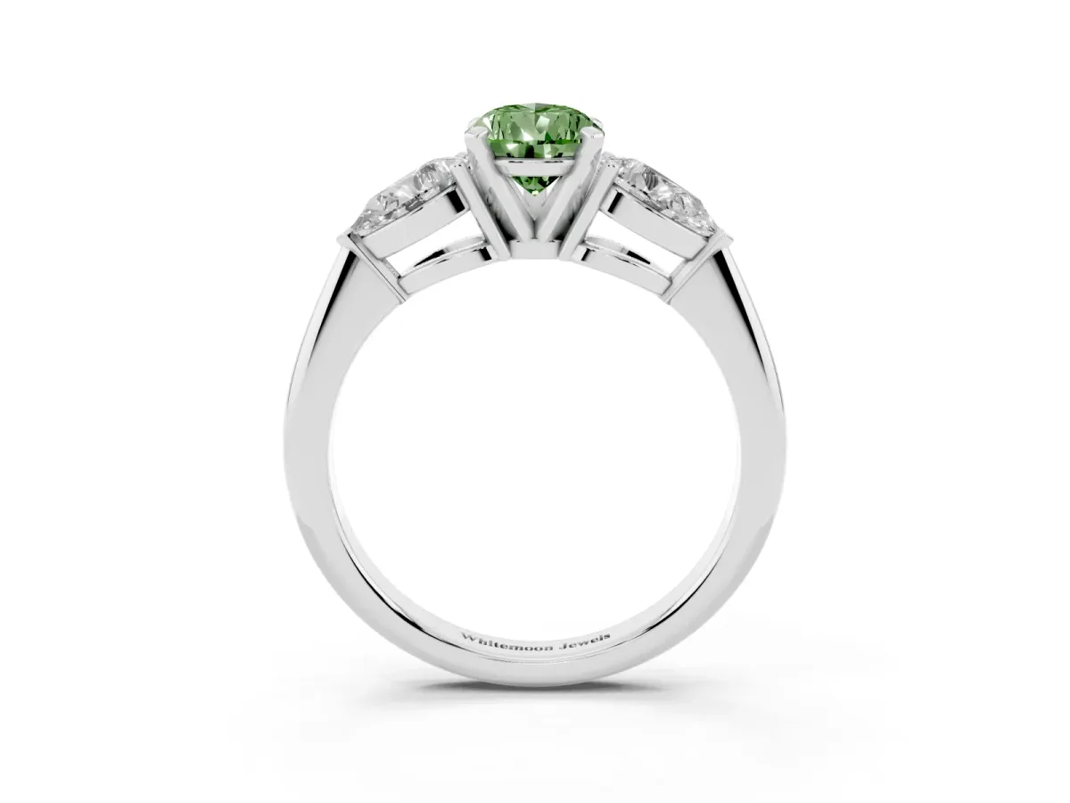 Fancy Green Three-Stone Pear Cut Diamond Ring with Pear Side Stones and Four-Prong Setting Platinum