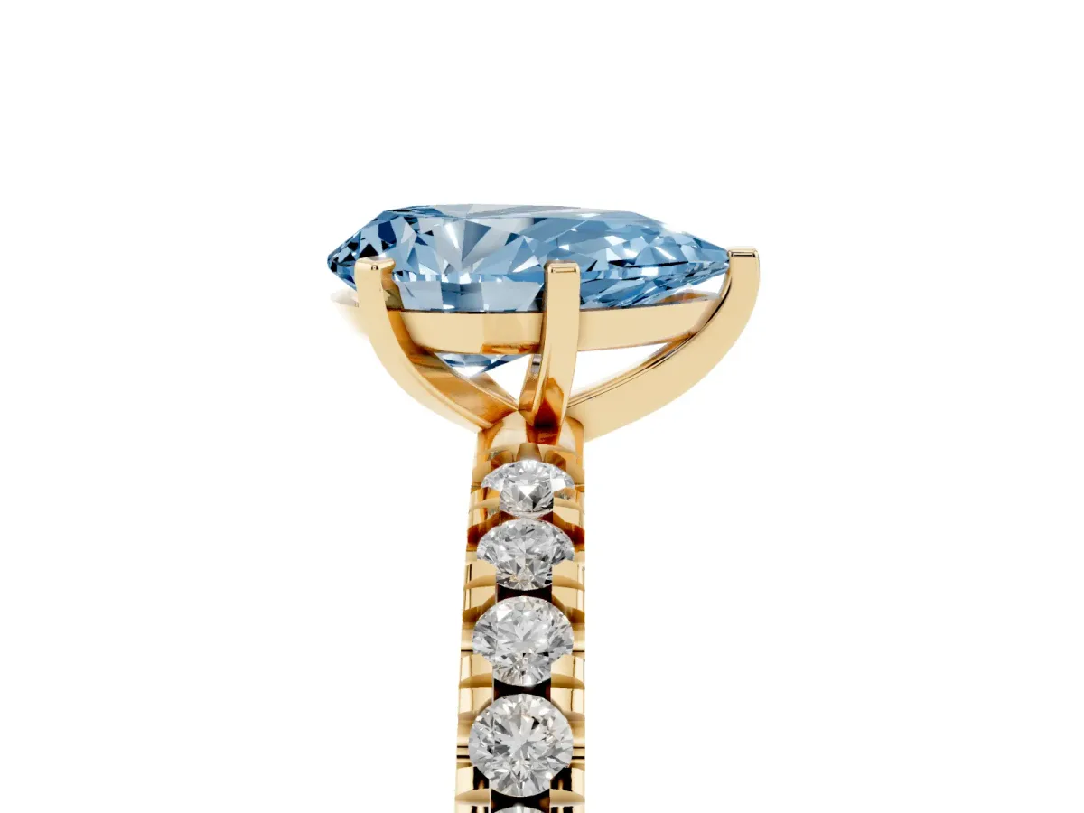 Fancy Blue Pear Cut Diamond Pavé Band Solitaire with Four-Prong Setting Yellow gold