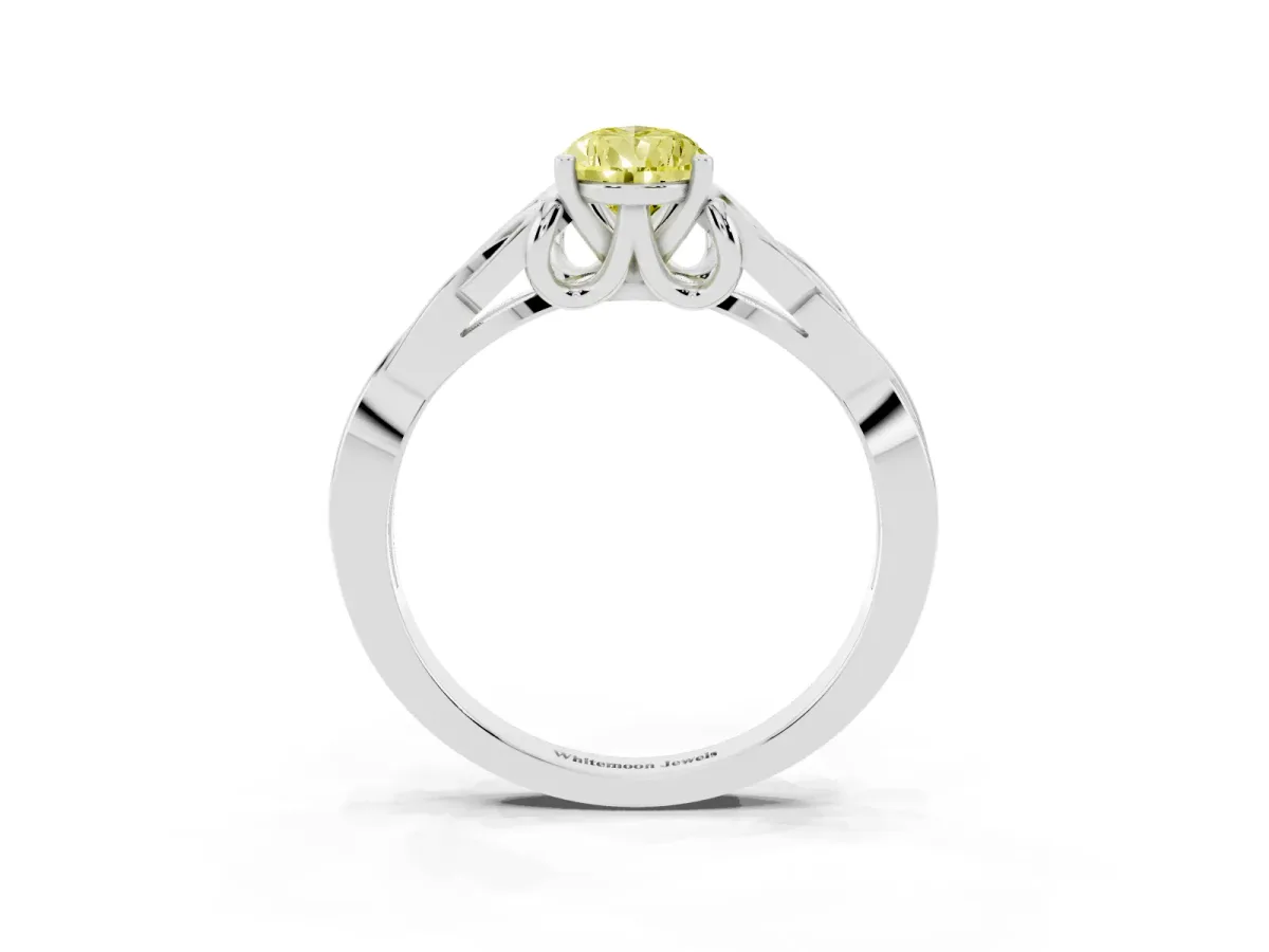 Fancy Yellow Pear Cut Diamond Solitaire Engagement Ring with Celtic Knot Band and Four-Prong Setting Silver