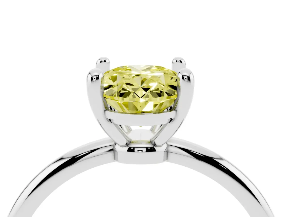 Fancy Yellow Oval Cut Solitaire Diamond Ring with 4-Prong Setting on a Classic Band Platinum