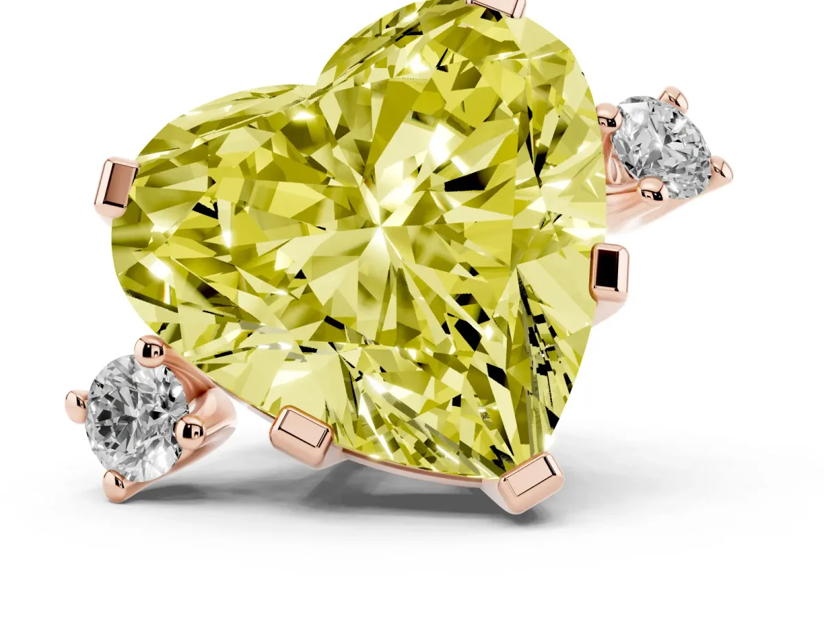 Fancy Yellow Heart Cut Cut Three-Stone Solitaire Ring with Round Accent Diamonds and Four-Prong Setting Rose gold