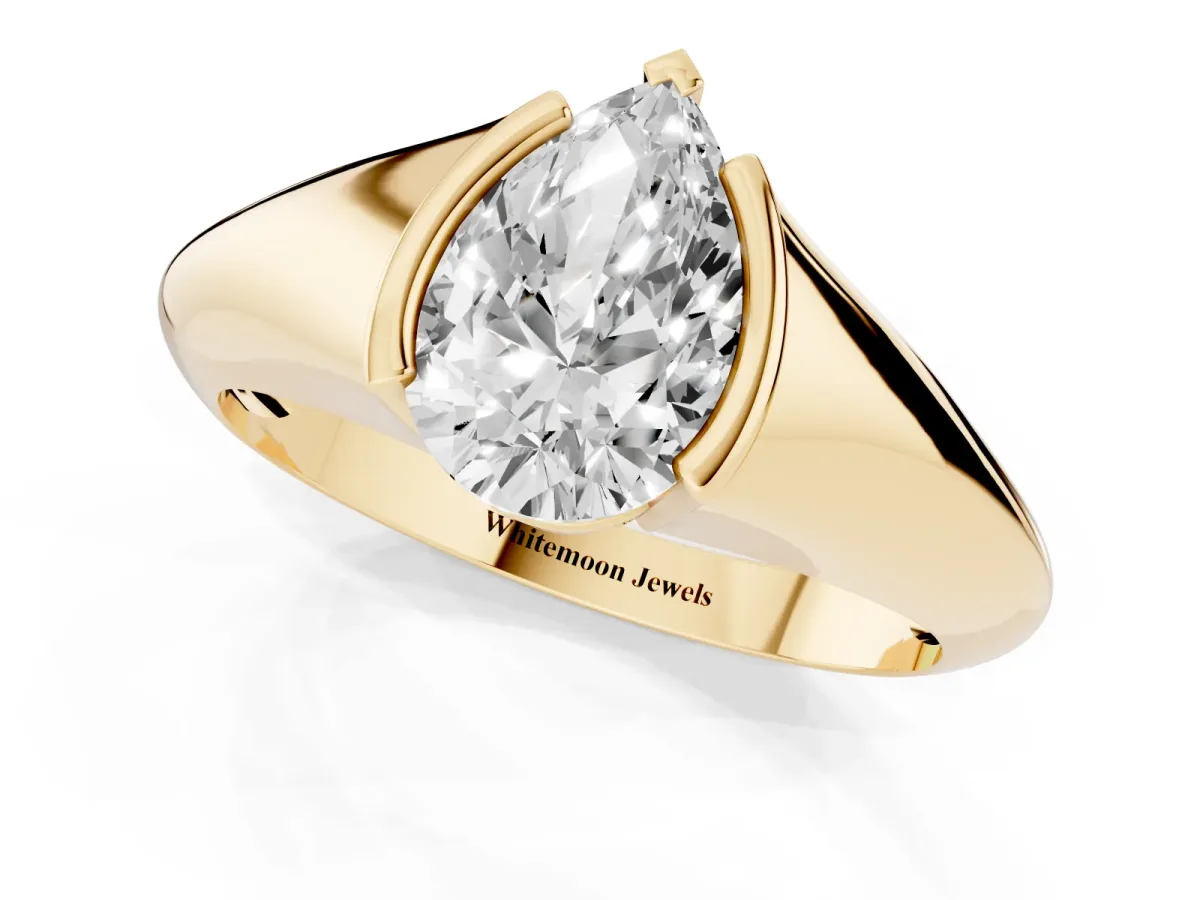 Pear Cut Solitaire Tension Set Diamond Ring Yellow gold