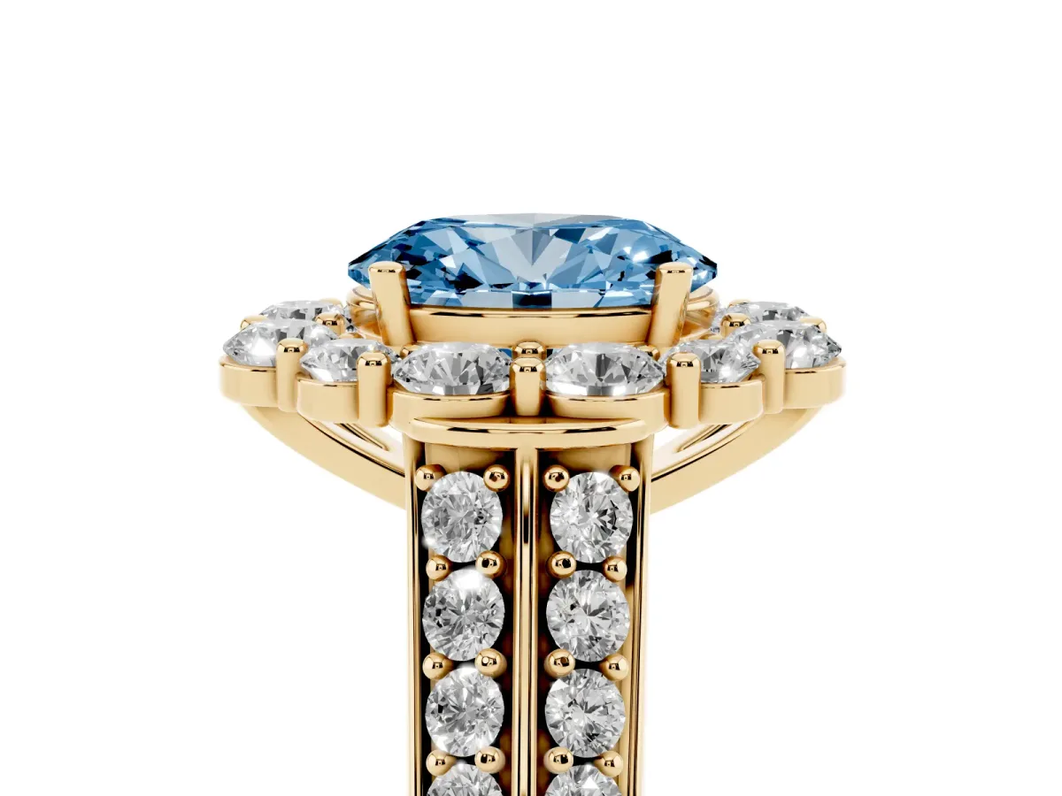 Fancy Blue Oval Cut Halo Diamond Engagement Ring with Split Shank and Prong Setting Yellow gold