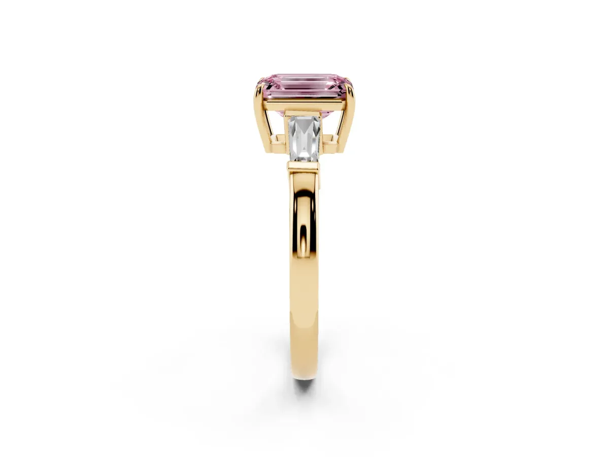 Fancy Pink Emerald Cut Diamond Three-Stone Ring with Tapered Baguette Side Stones and Prong Setting Yellow gold