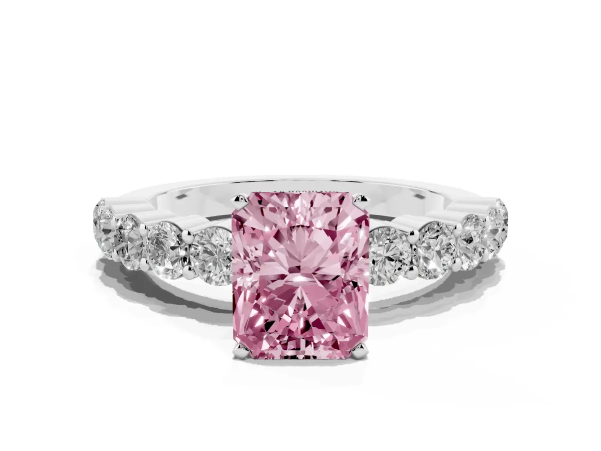 Fancy Pink Radiant Cut Diamond Solitaire Ring with Shared Prong Round Side Stones Platinum