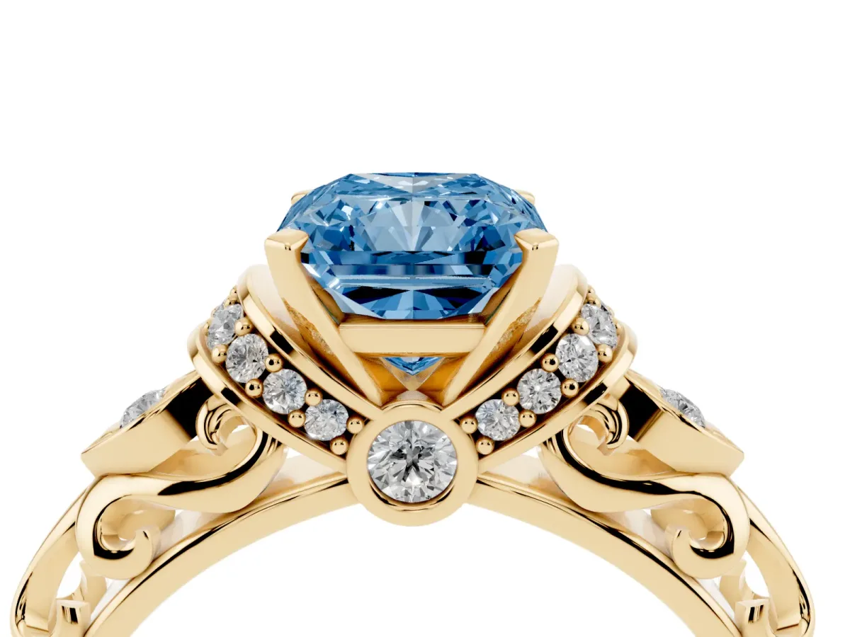Fancy Blue Radiant Cut Diamond Solitaire Ring with Filigree Band and Four-Prong Setting Yellow gold