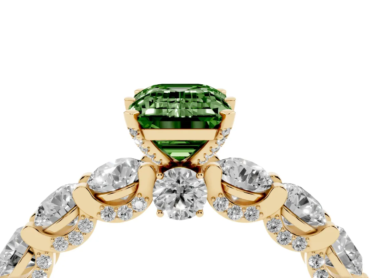 Fancy Green Emerald Cut Diamond Side Stone Engagement Ring with Four-Prong Setting Yellow gold