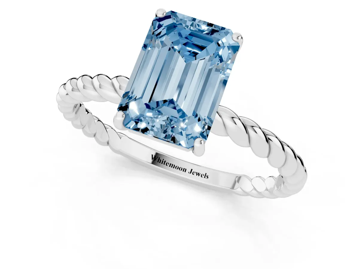 Fancy Blue Emerald Cut Solitaire Twist Band Ring with Four-Prong Setting Platinum