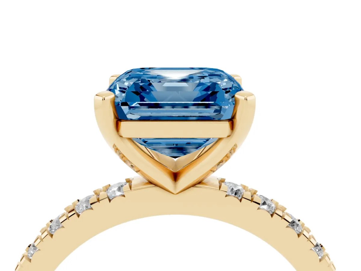 Fancy Blue Asscher Cut Diamond Pavé Band Solitaire with Four-Prong Setting Yellow gold