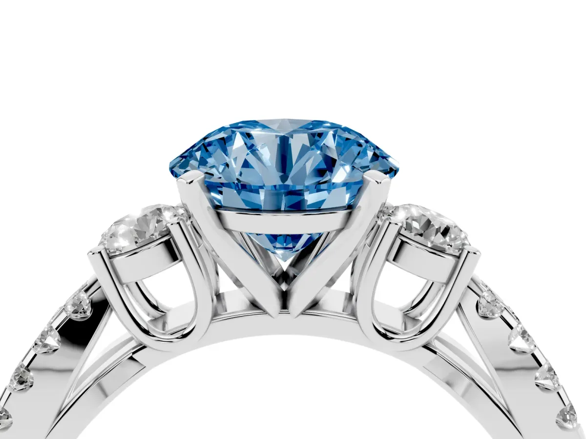 Fancy Blue Round Cut Diamond Three-Stone Ring with Pavé Split Shank and Four-Prong Setting White gold