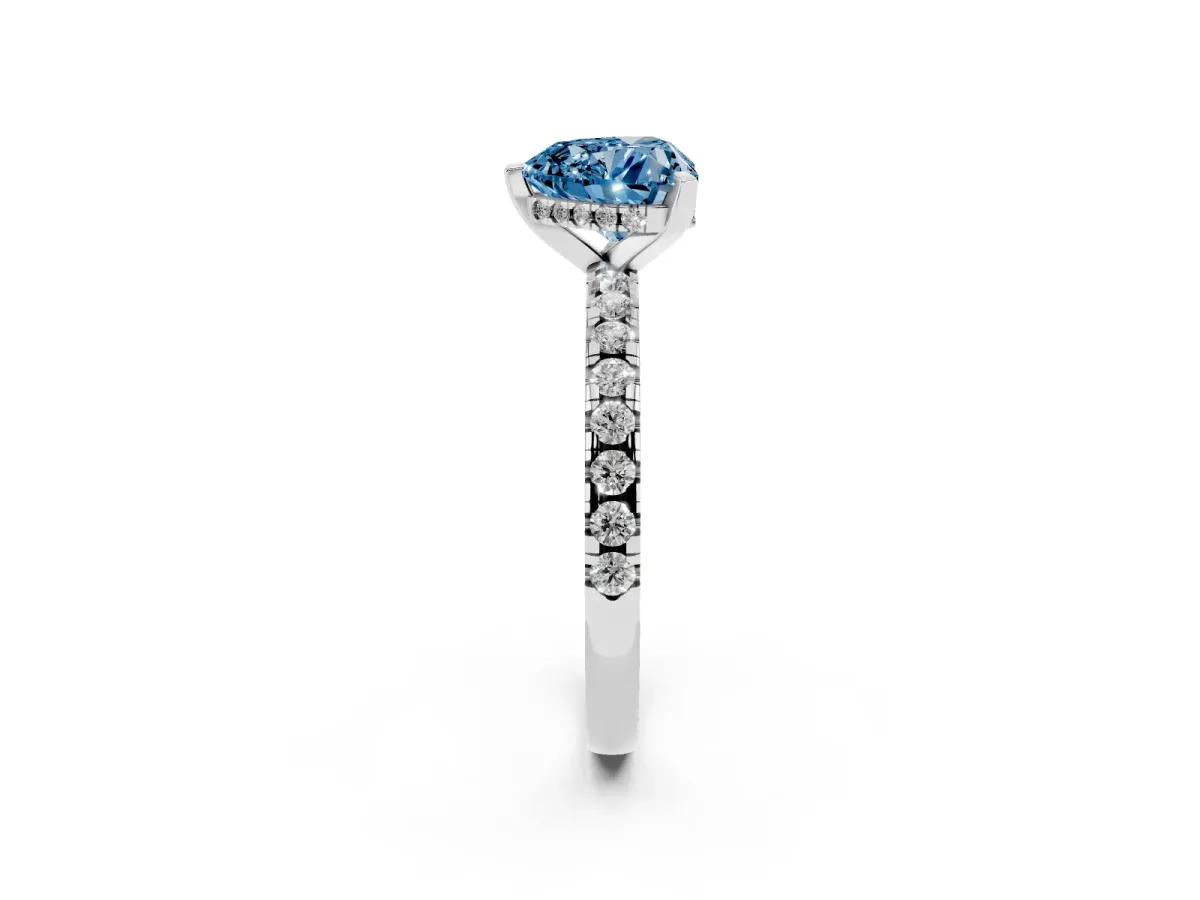 Fancy Blue Heart Cut Diamond Solitaire Ring with Round Pavé Band and Four-Prong Setting Silver