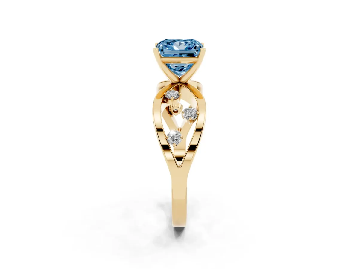 Fancy Blue Princess Cut Cut Solitaire Diamond with Side Stones on Criss-Cross Band and Four-Prong Setting Yellow gold