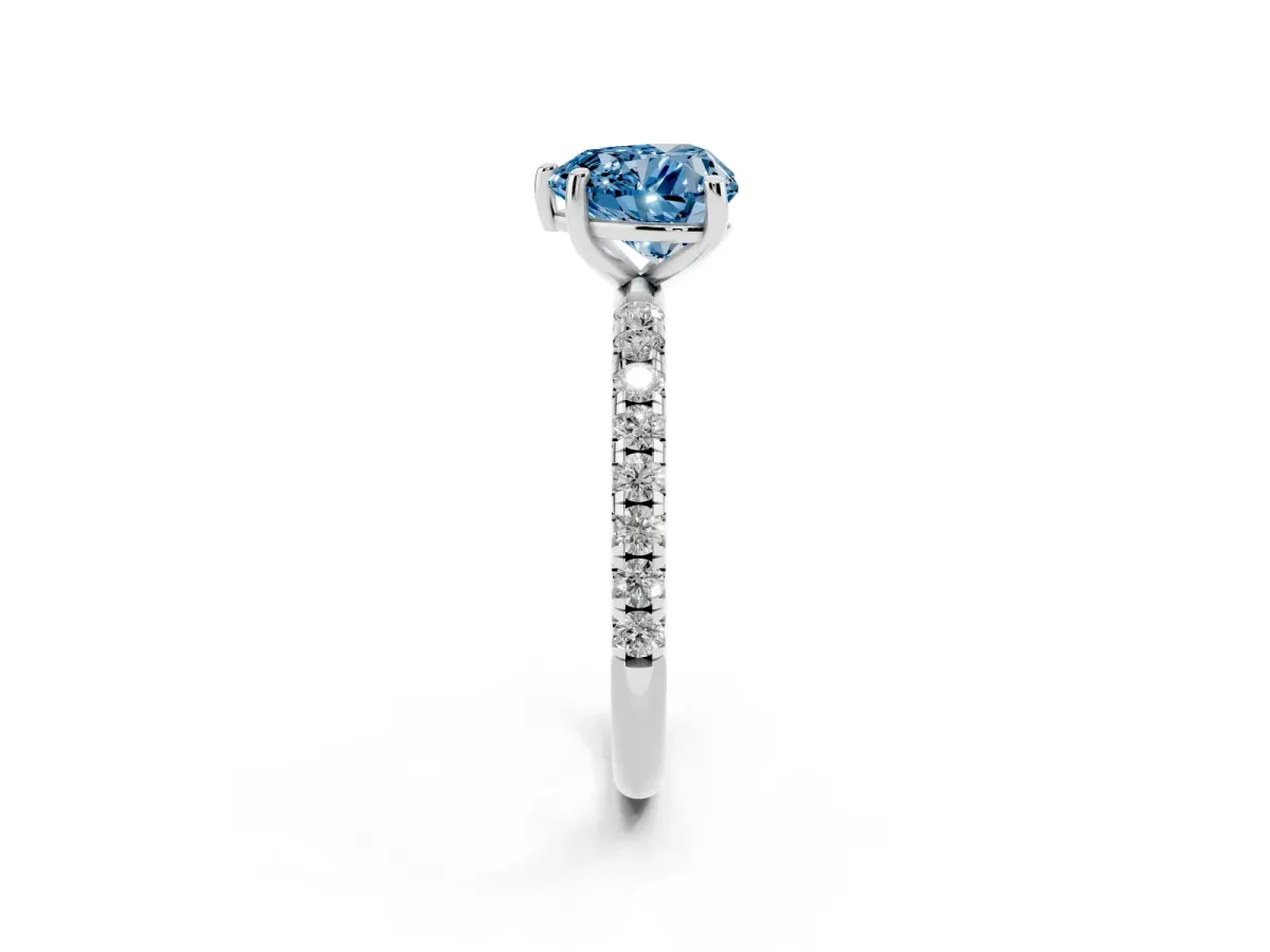 Fancy Blue Heart Cut Cut Diamond Solitaire Ring with Micro Pave Band and Four Prong Setting Silver