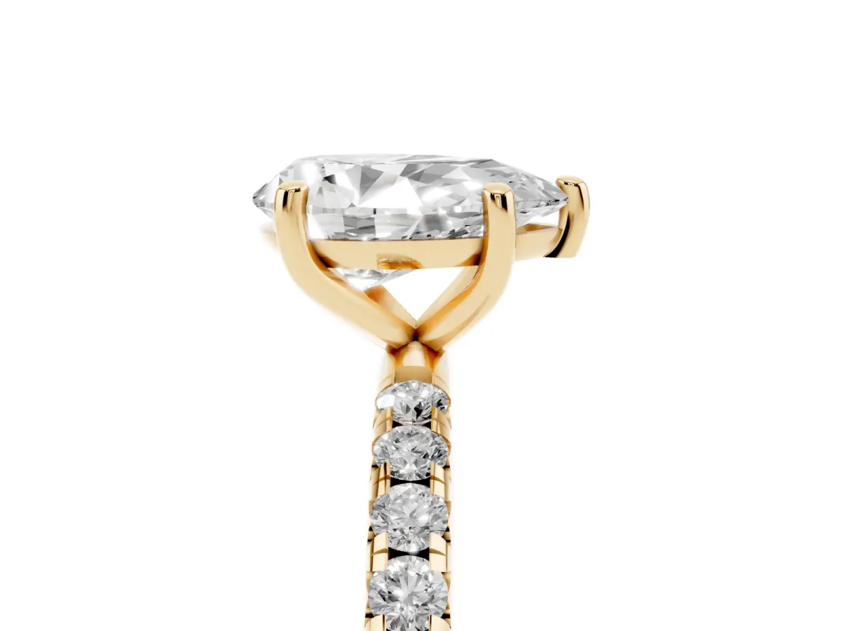 Pear Cut Cut Diamond Solitaire Ring with Micro Pave Band and Four Prong Setting Yellow gold