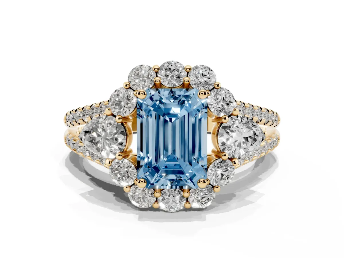 Fancy Blue Emerald Cut Halo Split Shank Diamond Engagement Ring with Prong Setting Yellow gold