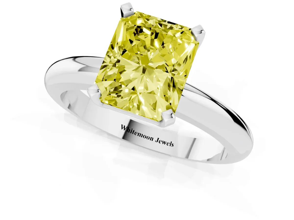 Fancy Yellow Radiant Cut Diamond Solitaire Engagement Ring with Round Band and Four-Prong Setting Platinum