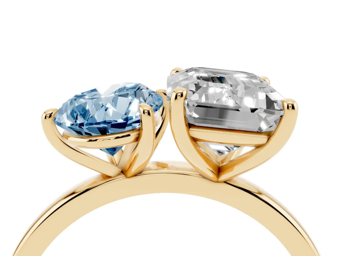 Fancy Blue Pear Cut and Emerald Cut Toi Moi Ring with Prong Setting Yellow gold
