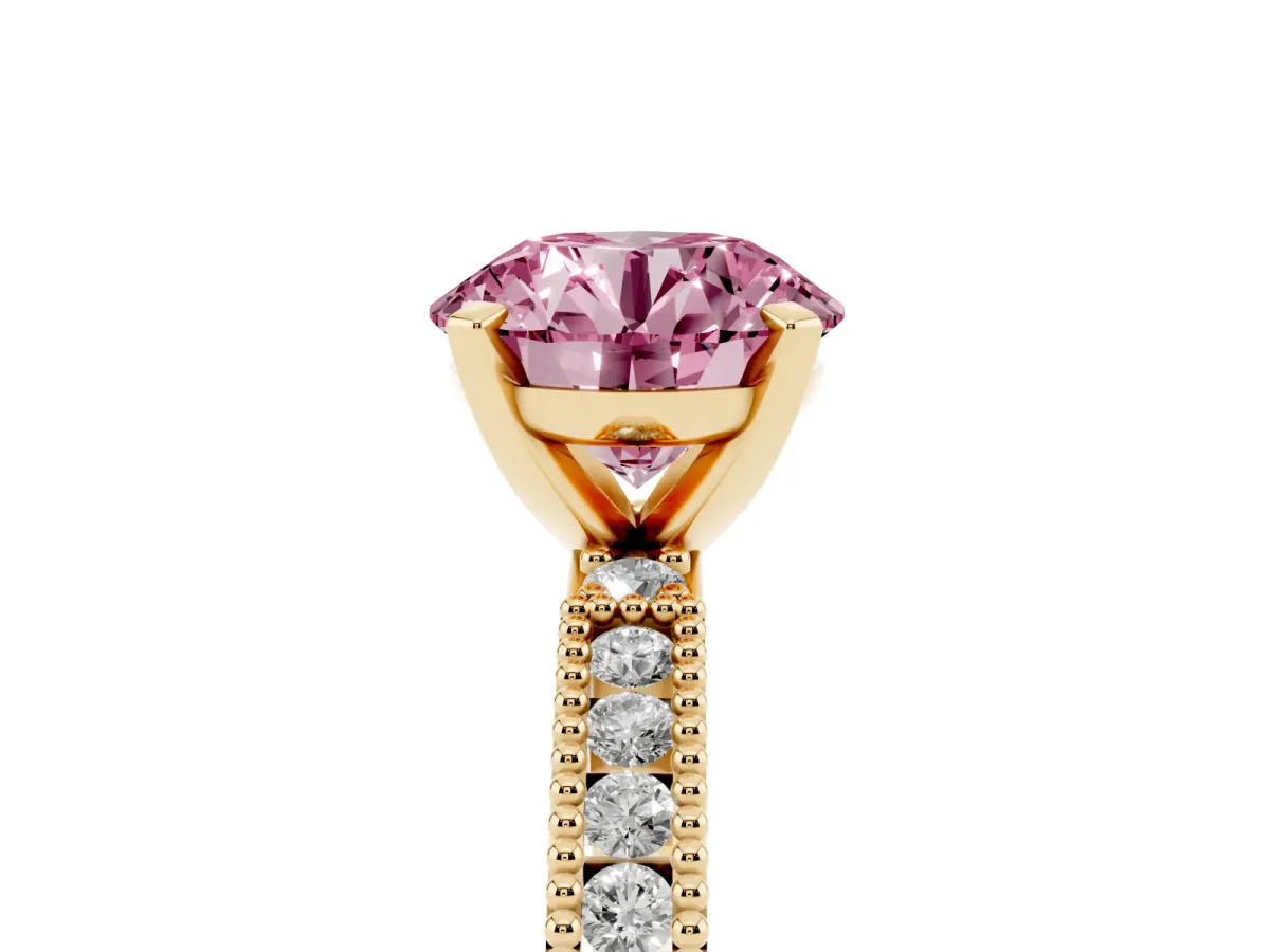 Fancy Pink Round Cut Solitaire with Pavé Band and Four-Prong Setting Yellow gold