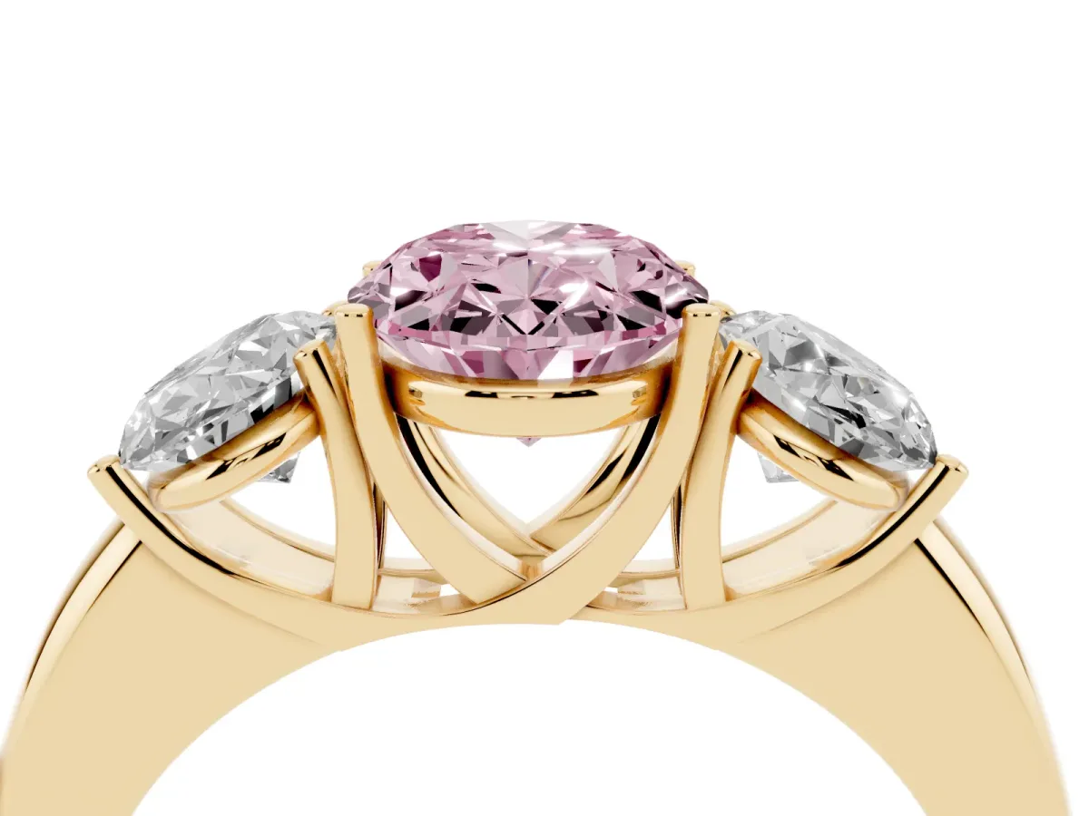 Fancy Pink Oval Cut Diamond Three-Stone Ring with Four-Prong Setting and Classic Band Yellow gold