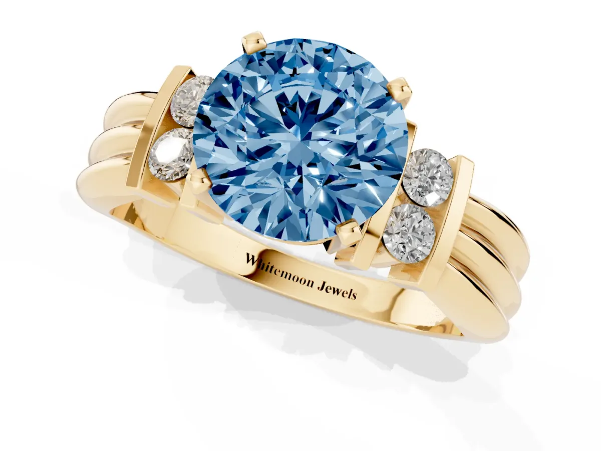 Fancy Blue Round Cut Cut Three-Stone Channel Set Ring with Bar Prongs Yellow gold
